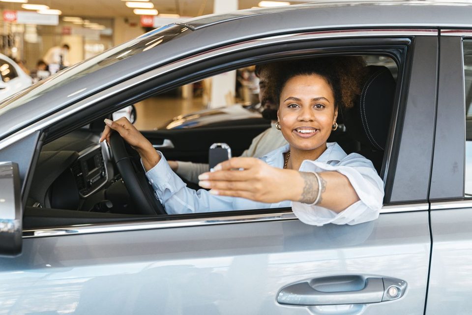 A happy customer with their car keys